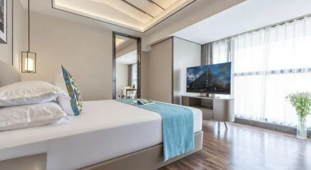 Четырёхместный семейный люкс Deluxe SSAW Boutiquel Hotel Xizi