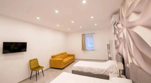 Номер Deluxe Suites Gaudioso Napoli center
