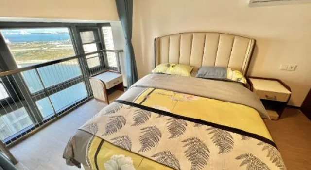 Кровать в общем номере Haitian Meisu Design Guesthouse (Ocean Flower Island)