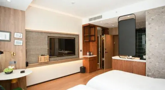 Кровать в общем номере Qingyang Anpo Hotel