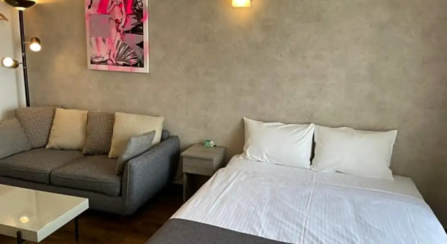 Четырёхместный номер Standard New Normal Hotel in NAMINOUE ニューノーマルホテルイン波の上