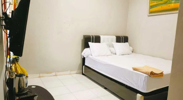 Express O 91277 Atiq Homestay Syariah