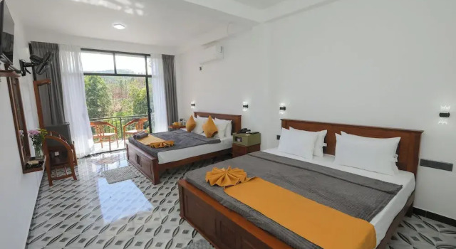 Camera quadrupla Deluxe con balcone e con vista sulle montagne Weightage Homestay
