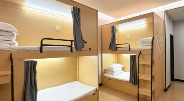 Кровать в общем номере (мужской номер) Huashan Gehui Hotel
