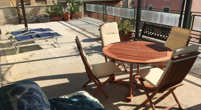 Апартаменты Attico con grande terrazzo