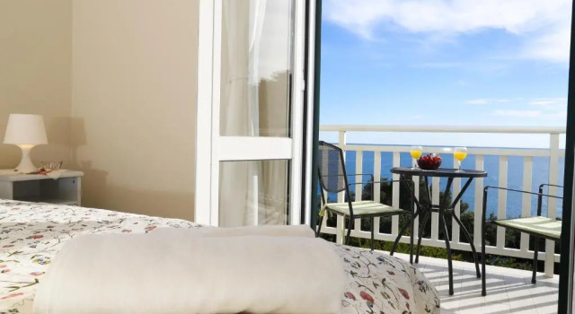 Апартаменты с 2 комнатами с балконом и с видом на море Apartments Villa Lucy