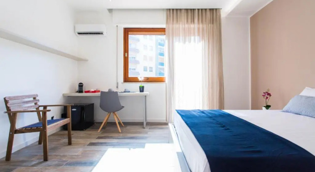 Четырёхместный номер Deluxe Politeama Luxury Suites