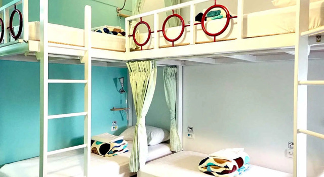 Кровать в общем номере 安蘭居旅店 An Lan Jie Hotel