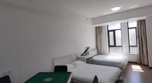 Кровать в общем номере Harbin Orange Hotel Apartment (Yintai Store)