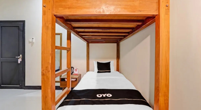 Économie chambre Capital O 90811 Myhome