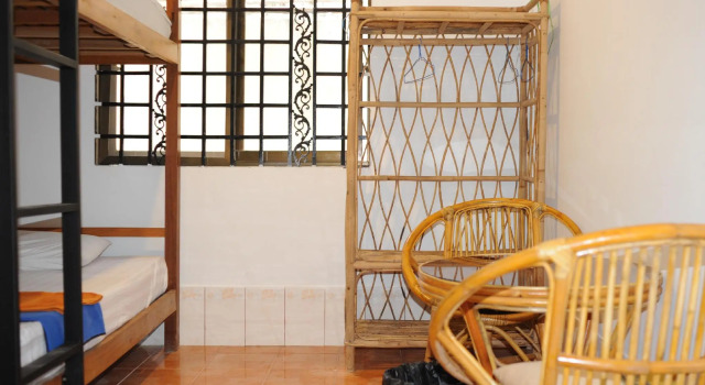 Кровать в общем номере The City Premium Guest House