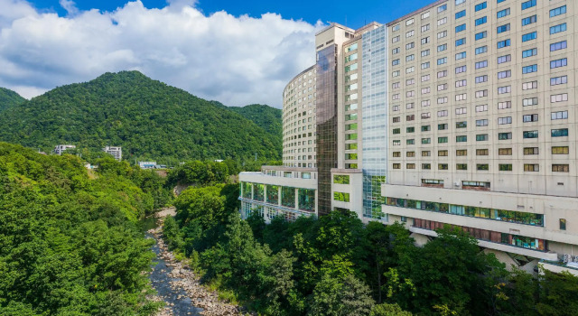 Кровать в общем номере Jozankei View Hotel