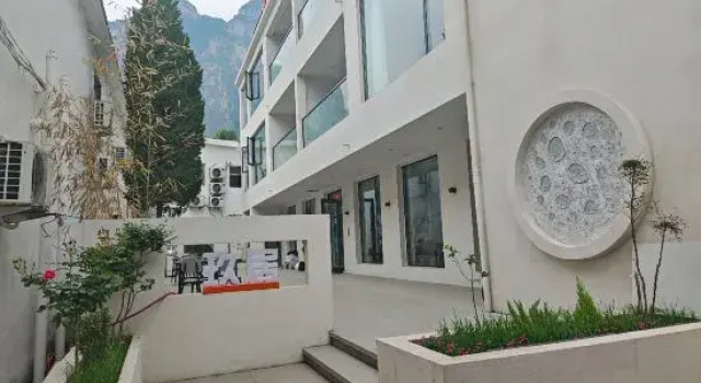 Jiujue Homestay, Prenota Hotel Hotel a Shanxi con parcheggio, Parcheggio