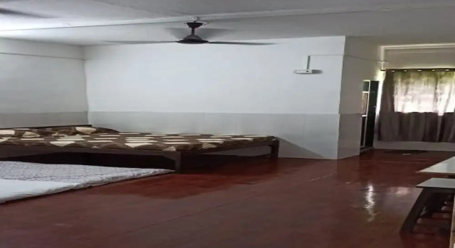 Кровать в общем номере Starlight Resort