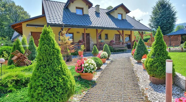 Апартаменты Całoroczne domki apartamentowe "Pod lipą" Izabela Konopelska