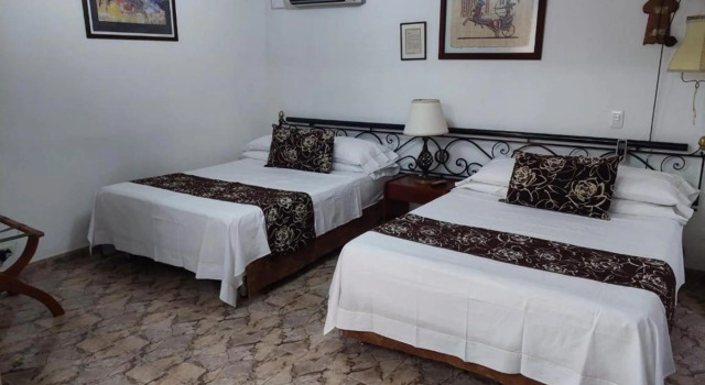 Hotel Pacande, Забронировать Отель Отели в центре Нейва, в центре, Парковка