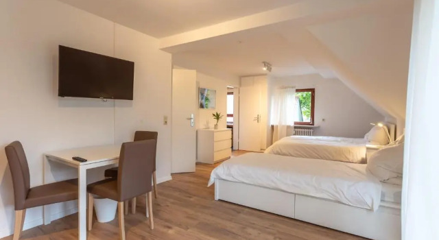 Кровать в общем номере city-house-bühl