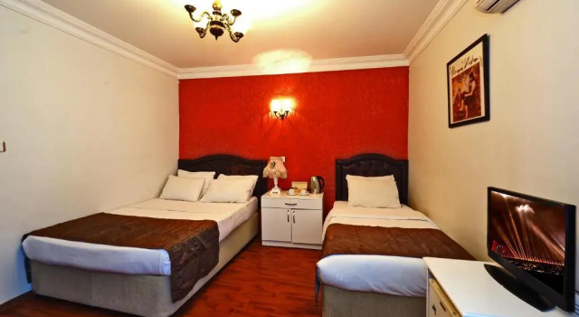 Трёхместный номер The Sunrise Hotel