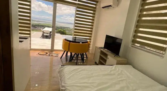 Вилла с балконом и с красивым видом из окна Caliraya Heights Resorts and Events Place