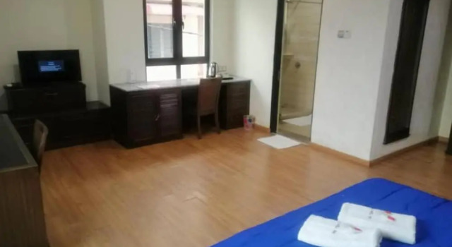 Номер Deluxe Capital O 90653 Maxwell Inn Boutique Hotel