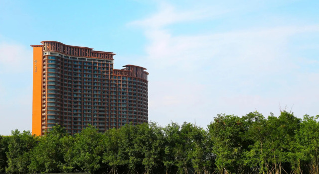 Кровать в общем номере Qingdao Mangrove Tree Resort World - Red Coral Hotel