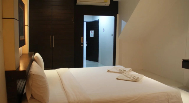New International Guest House, Забронировать Гостевой дом Патонг-Бич остров Пхукет