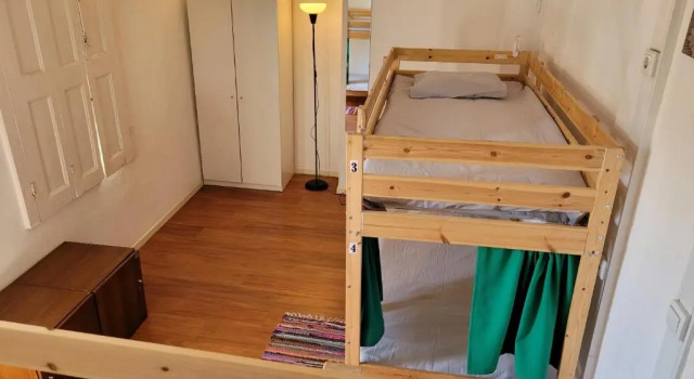 Postel ve společném pokoji pro ženy inBraga Hostel