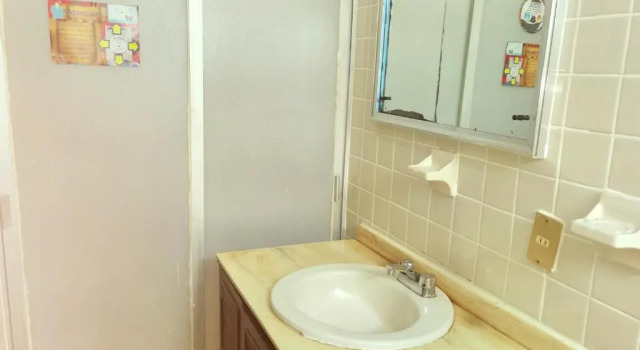 Кровать в общем номере The Roof Backpackers