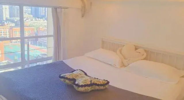 Люкс Дуплекс с 2 комнатами с балконом Wuhan Qixuan Homestay (Wuhan Tiandi Hankou Jiangtan Branch)