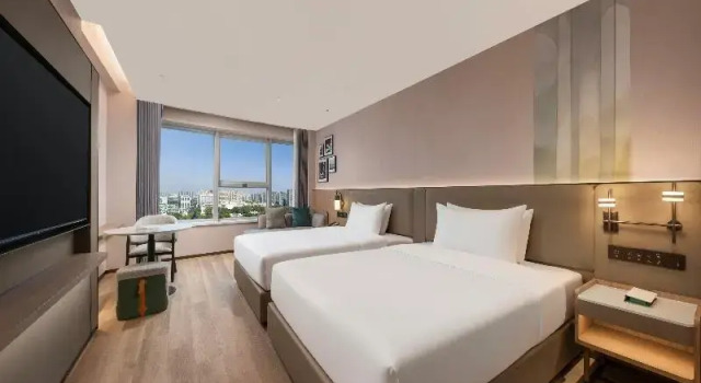 Четырёхместный номер Premium с красивым видом из окна Holiday Inn Yiwu Center by IHG