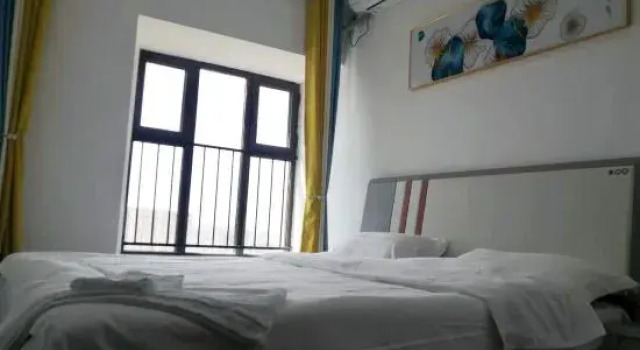 Люкс с 3 комнатами с видом на море Yantai Zijiayou Homestay