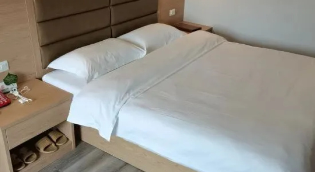Трёхместный семейный люкс Jiangxia Hotel
