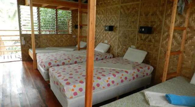 Кровать в общем номере Panglao Chocolate Hills Resort