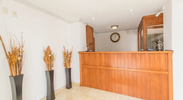 Suites Poliforum Inn