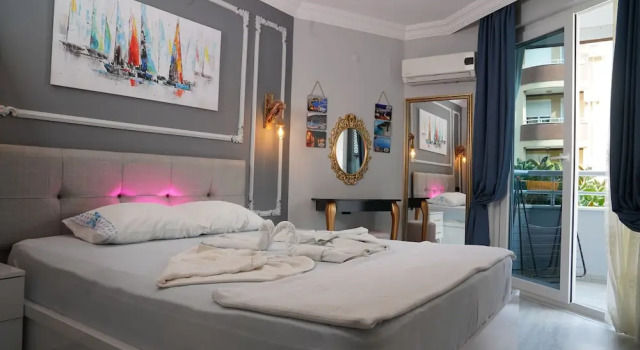 Семейный люкс Deluxe с балконом Alanya polat tatil evleri