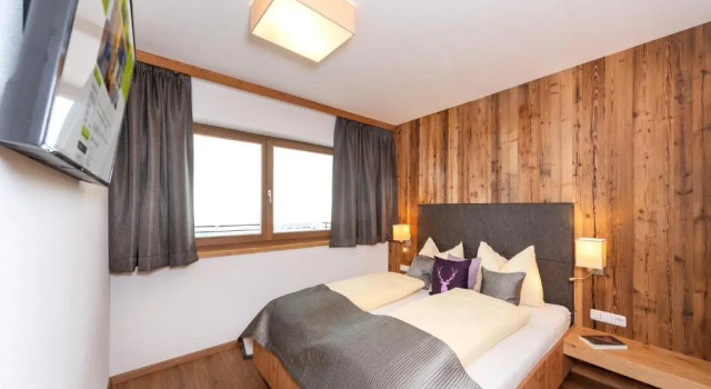 Апартаменты с 3 комнатами с балконом Das Grünholz Aparthotel