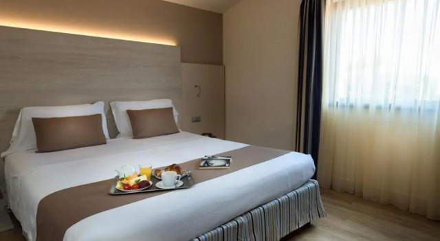 Четырёхместный номер Comfort Hotel Arena