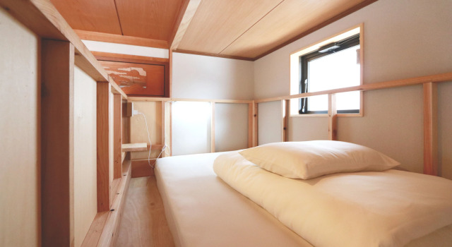 Bett im Wohnheim Tips Hotel