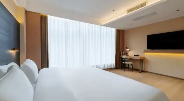 Четырёхместный люкс Chonpines Hotels·Anshun Taixiang Baili