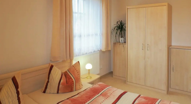 Апартаменты Modernes Apartment in Kuehlungsborn mit Garten