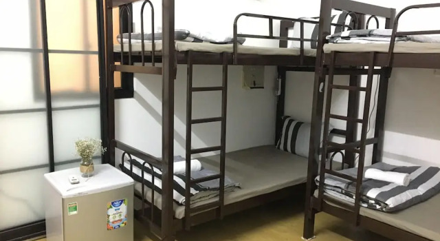 Кровать в общем номере Condodo Hostel