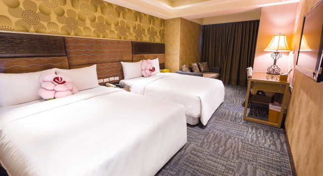 Кровать в общем номере Han She Hotel