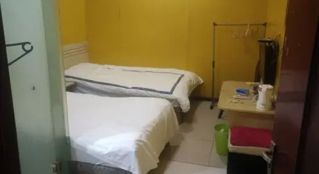 Кровать в общем номере Ningbo Chenglou Guest House