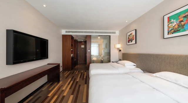 Четырёхместный семейный номер Standard SSAW Boutique Hotel TianSheng QiDong