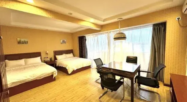 Кровать в общем номере Jiaohe Zijin Star Hotel