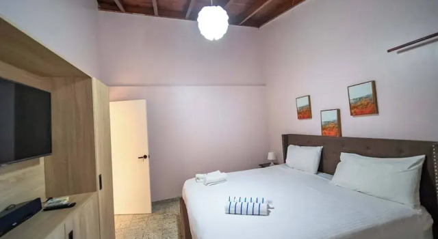 Colonial 2BR Apartment 2mins walk to beach, Забронировать Апартаменты/квартира Апартаменты провинции Пуэрто-Платы, Апартаменты/квартира