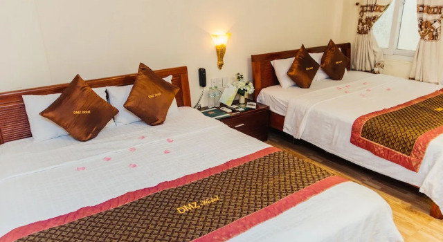 Четырёхместный семейный номер Standard DMZ Hotel ,Central Hue ,Near Perfume River