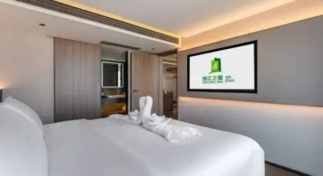 Люкс Deluxe Jinjiang Inn Fashion Hotel (Haikou East High-Speed Railway Station Longhu Tianjie Branch)