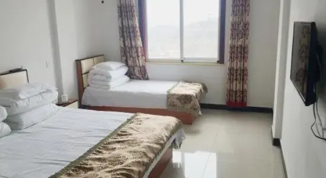 Кровать в общем номере Tianjin Fuchun Farm stay