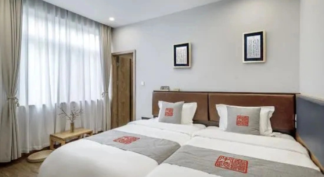 Люкс с 2 комнатами Dust and Hustle Weiyuan Designer Zen Homestay (Chongzhou Jiezi Ancient Town Branch)